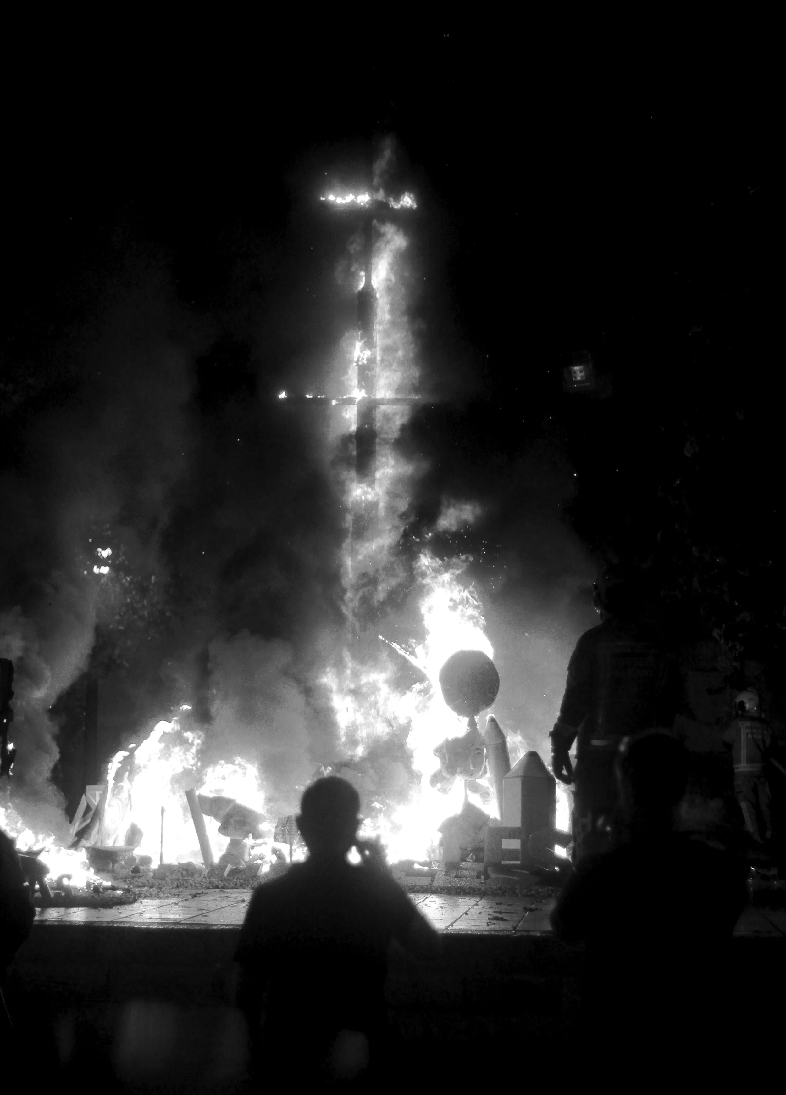 Documentary photographs capturing the intensity, ritual and emotion of Las Hogueras de Alicante before the flames turn everything to ash.
