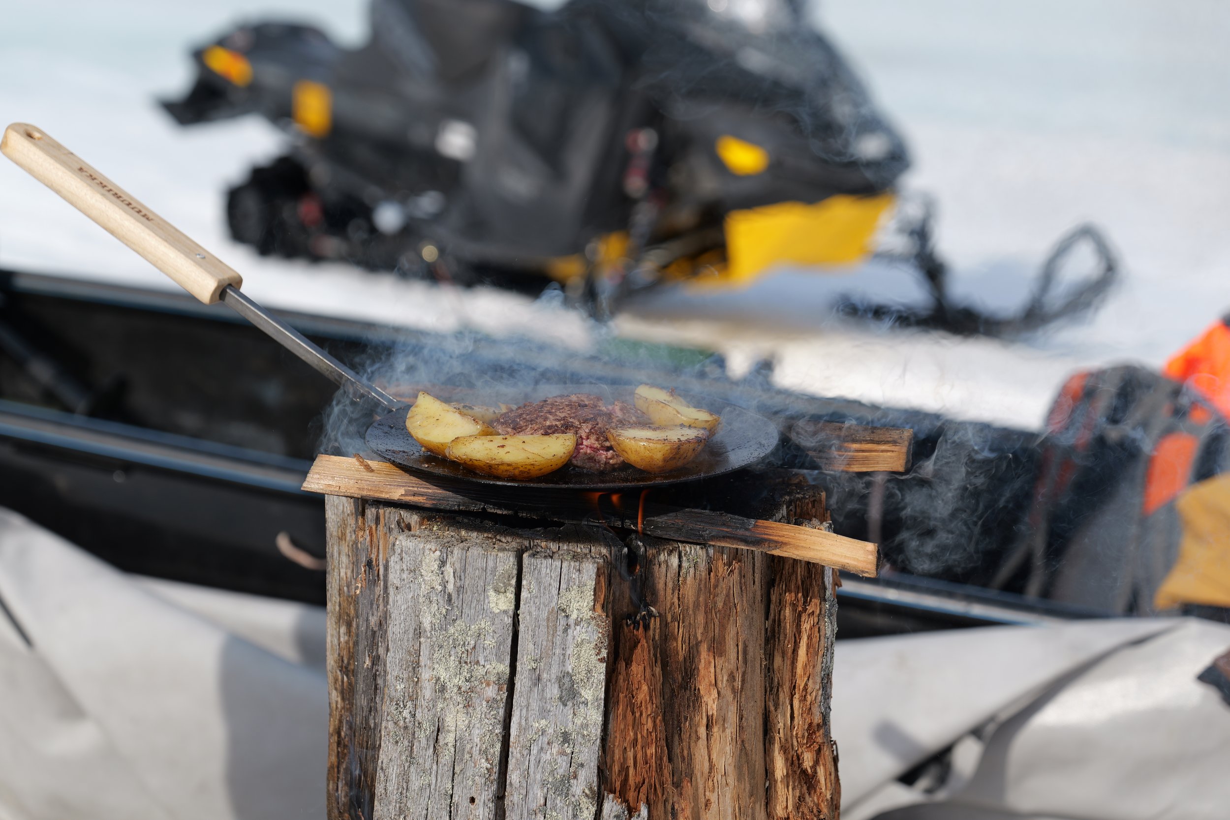 Custom snowmobiling tours and safaris in Oulu