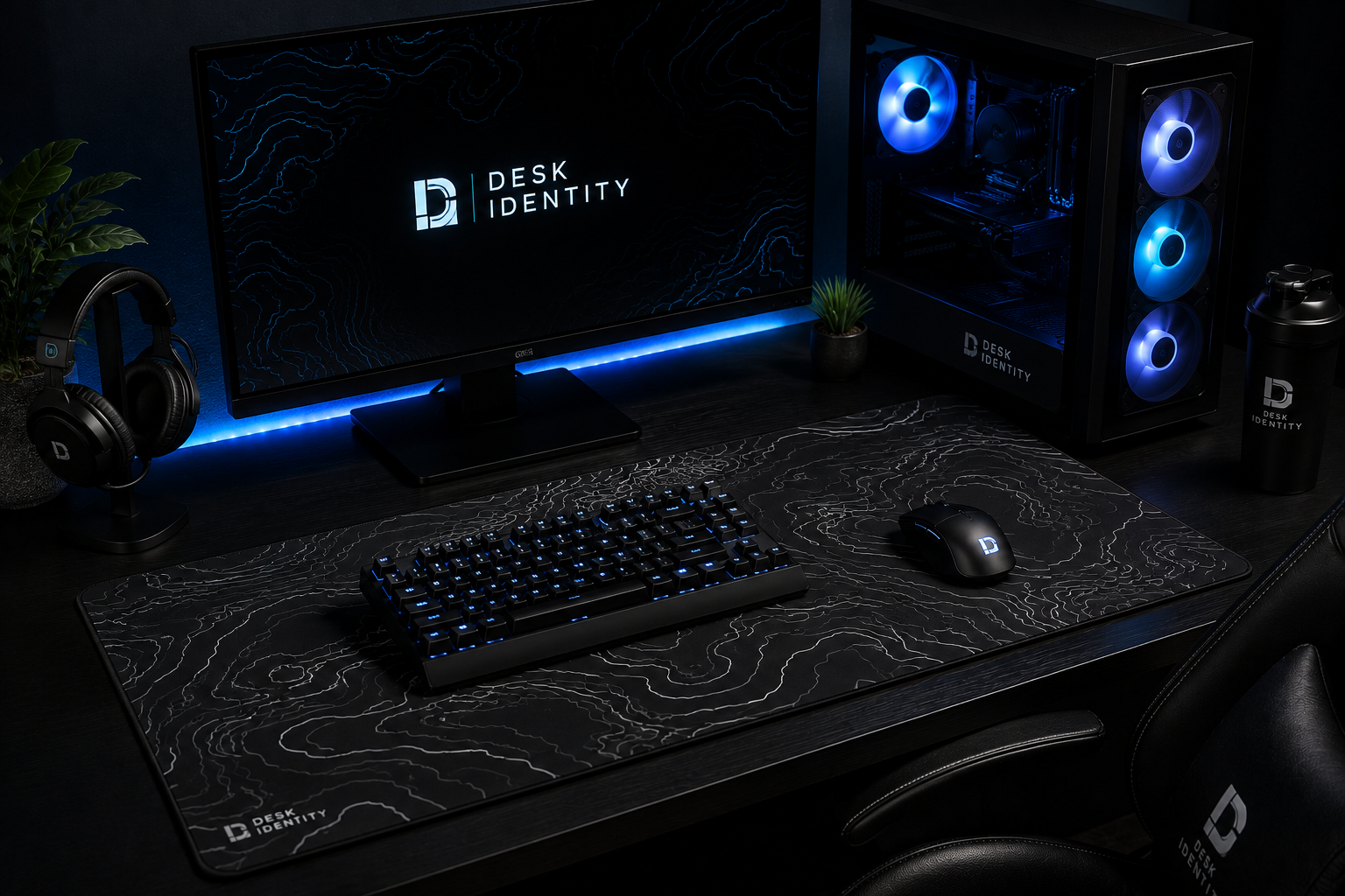 minimal gaming setup with a full XL desk mat advertising desk identity