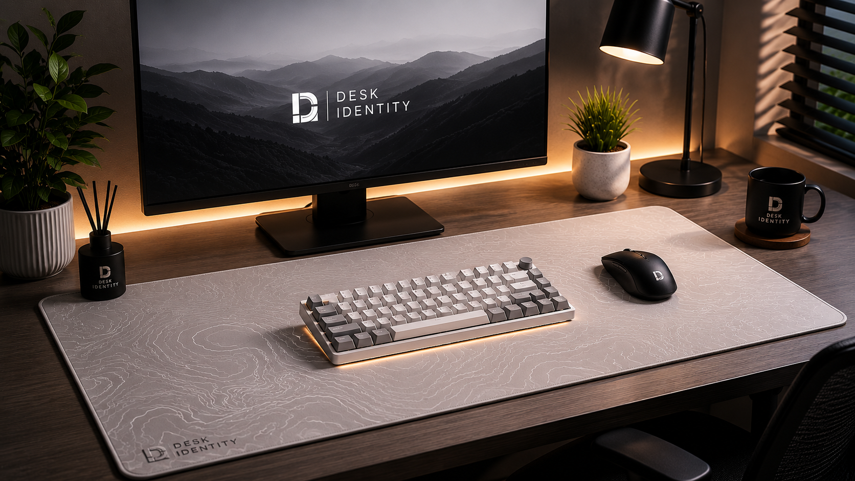 Minimal black desk setup with premium extended mouse pad