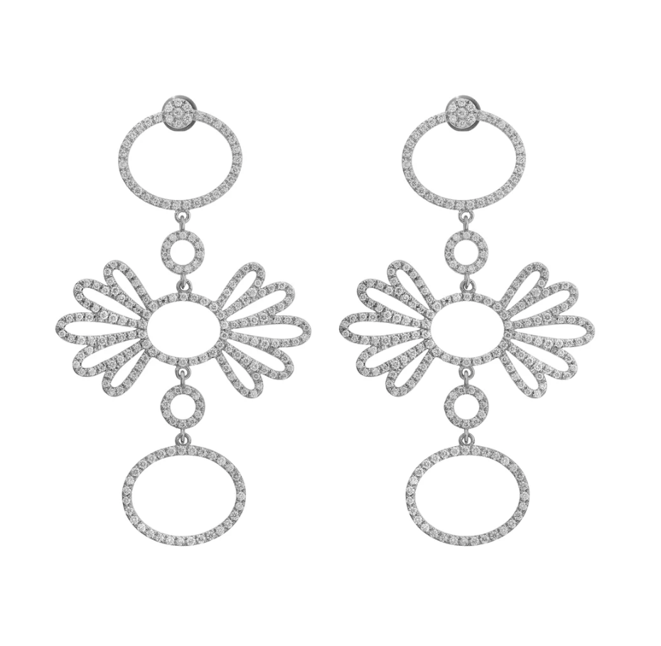 Diamond-studded dangling earrings with a flower-like design and circular elements.