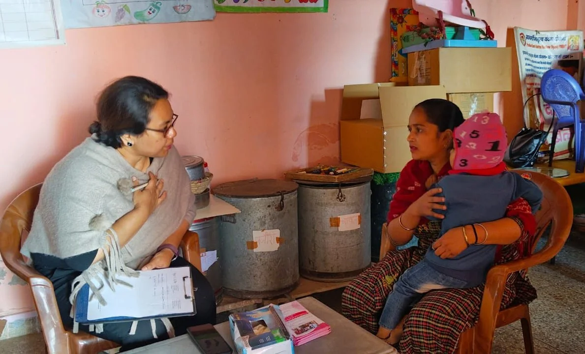 Dr Ananya is conducting a Breast Screening Camp in an anganwadi with an NGO and educating women about Breast Health