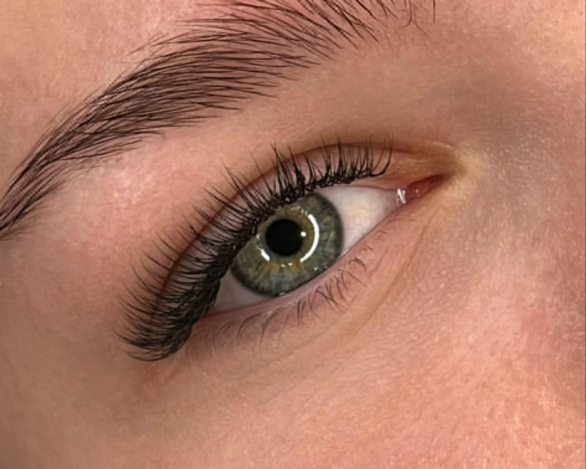 Classic eyelash extension set by Olga Fleming showing clean isolation, placement and natural styling