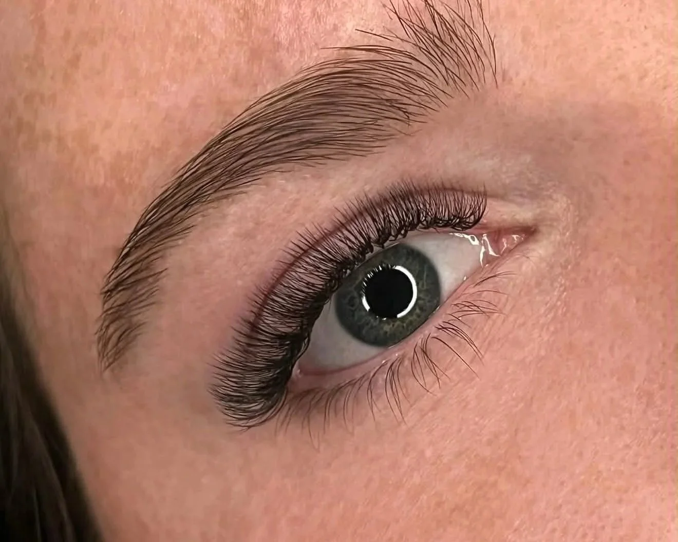 Online lash course student result showing a completed eyelash extension set