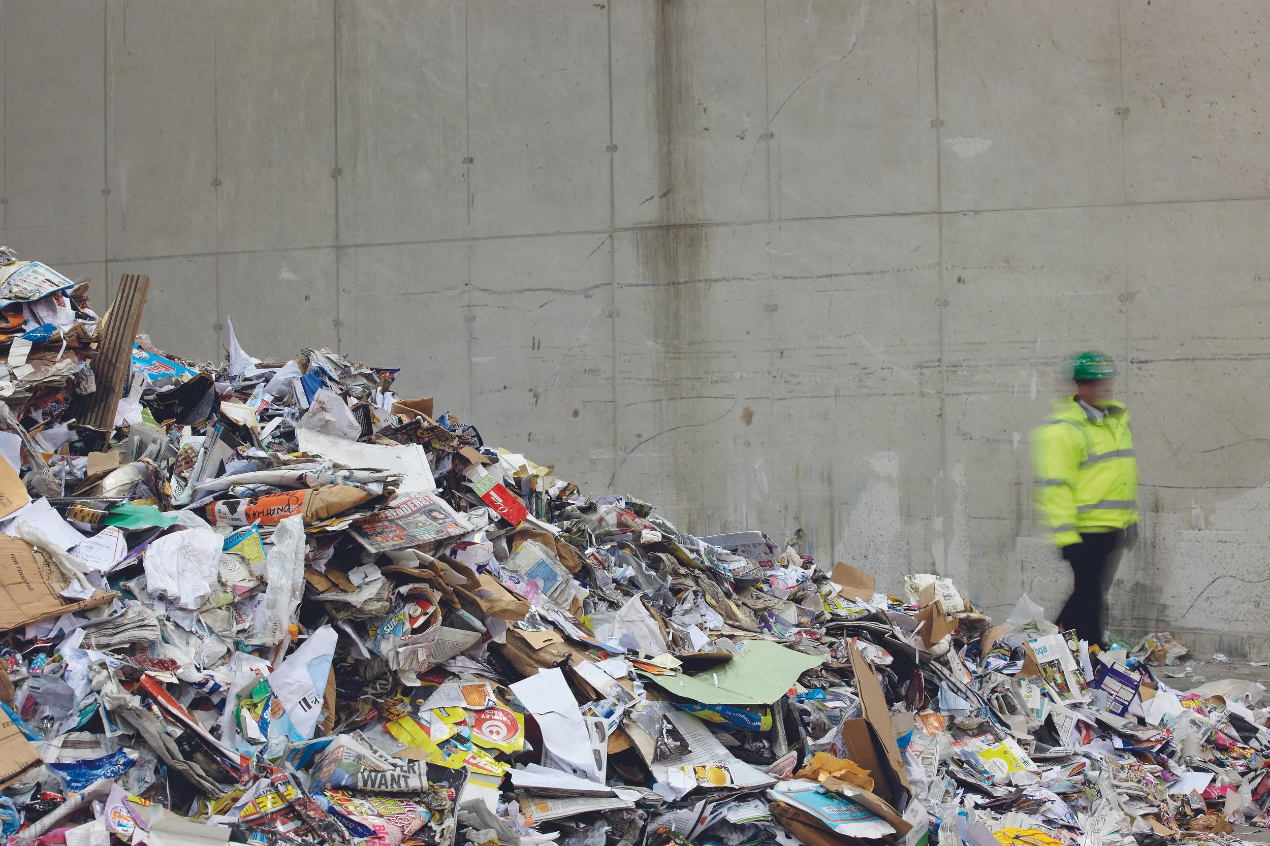 Large pile of cardboard at sorting facility