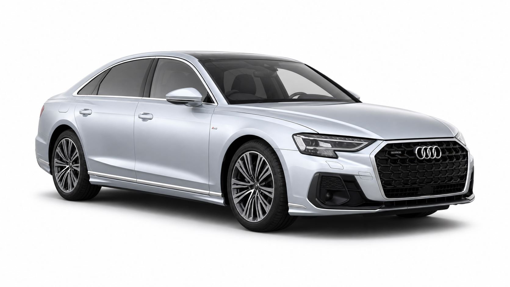 Silver Audi sedan car with a sleek design and black grille, parked on a white background.