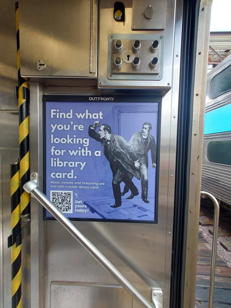 Ad featuring Sherlock Holmes in the Metra train car