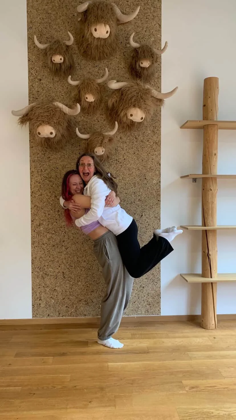 Molly Pretzel with Pole Dance student