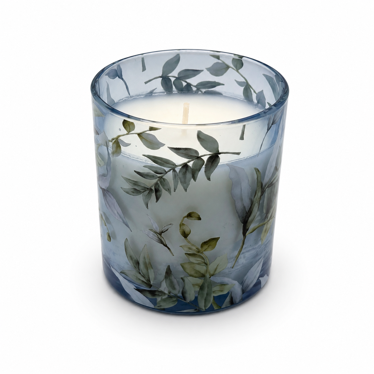 Blue floral scented candle in glass jar included in Luxe Blue Velvet Hand and Nail Retreat Box