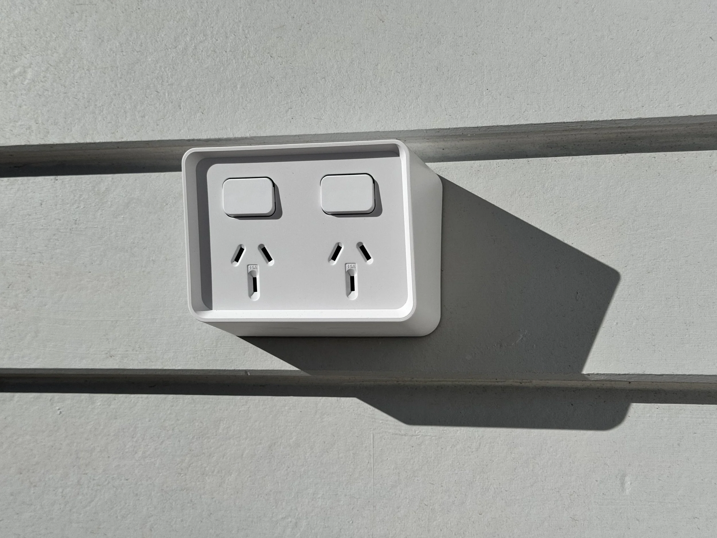 OUTDOOR POWER - Built for everyday outdoor use, this Clipsal Iconic weatherproof double power point delivers durable, accessible power with a sleek finish suited to modern homes and exterior areas.