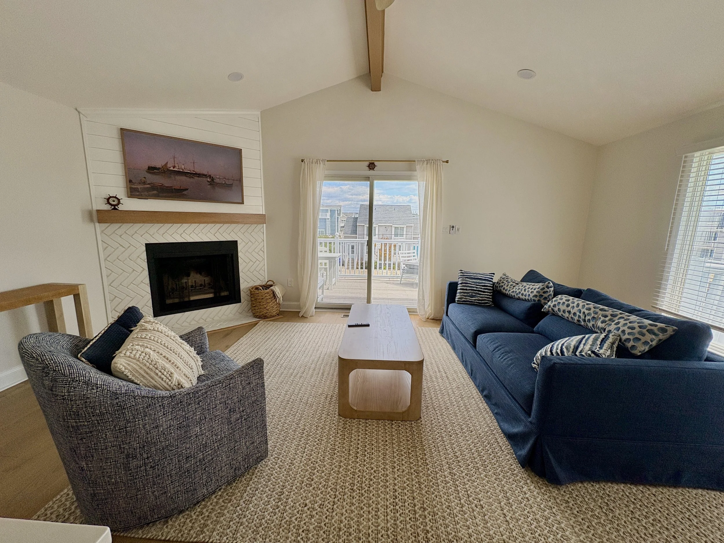 Spacious living area with direct access to large private deck.  Features Frame TV and brand new furnishings as of April 2026
