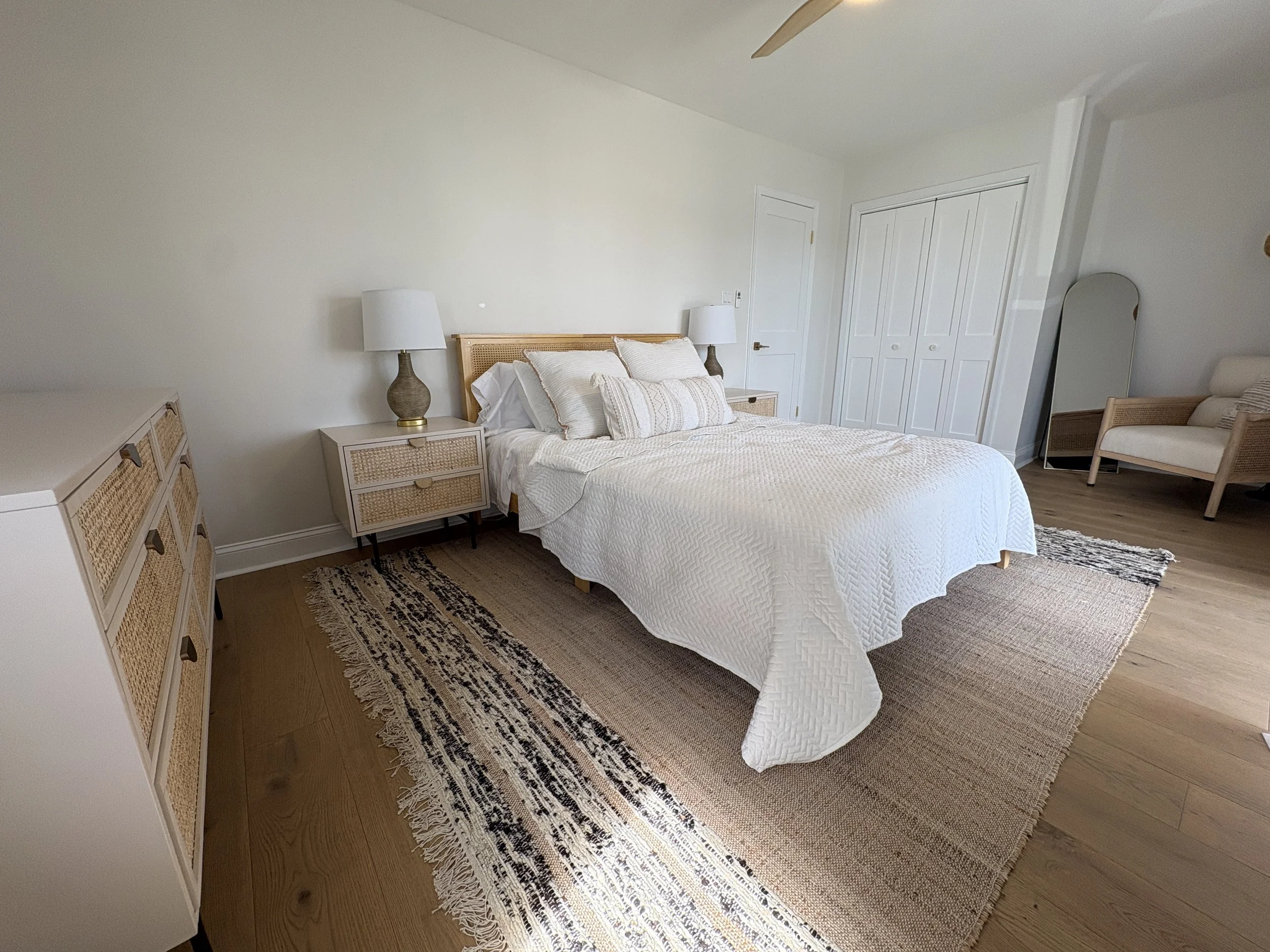 Third bedroom with queen bed and private deck (facing front of house).