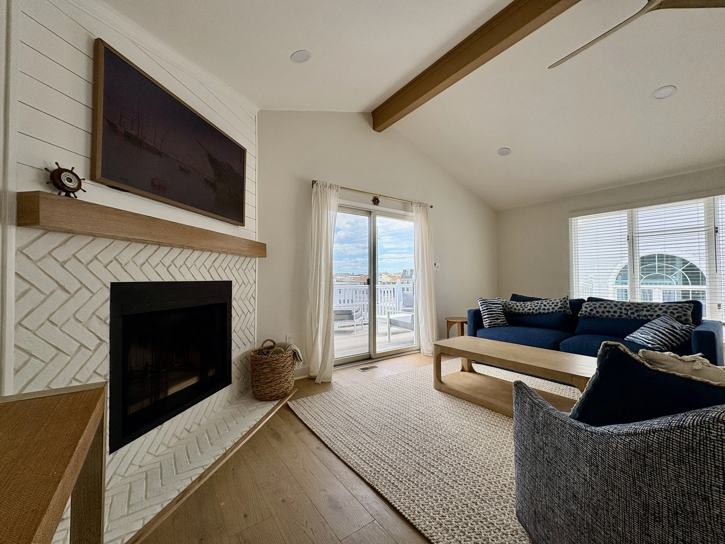Spacious living area with direct access to large private deck