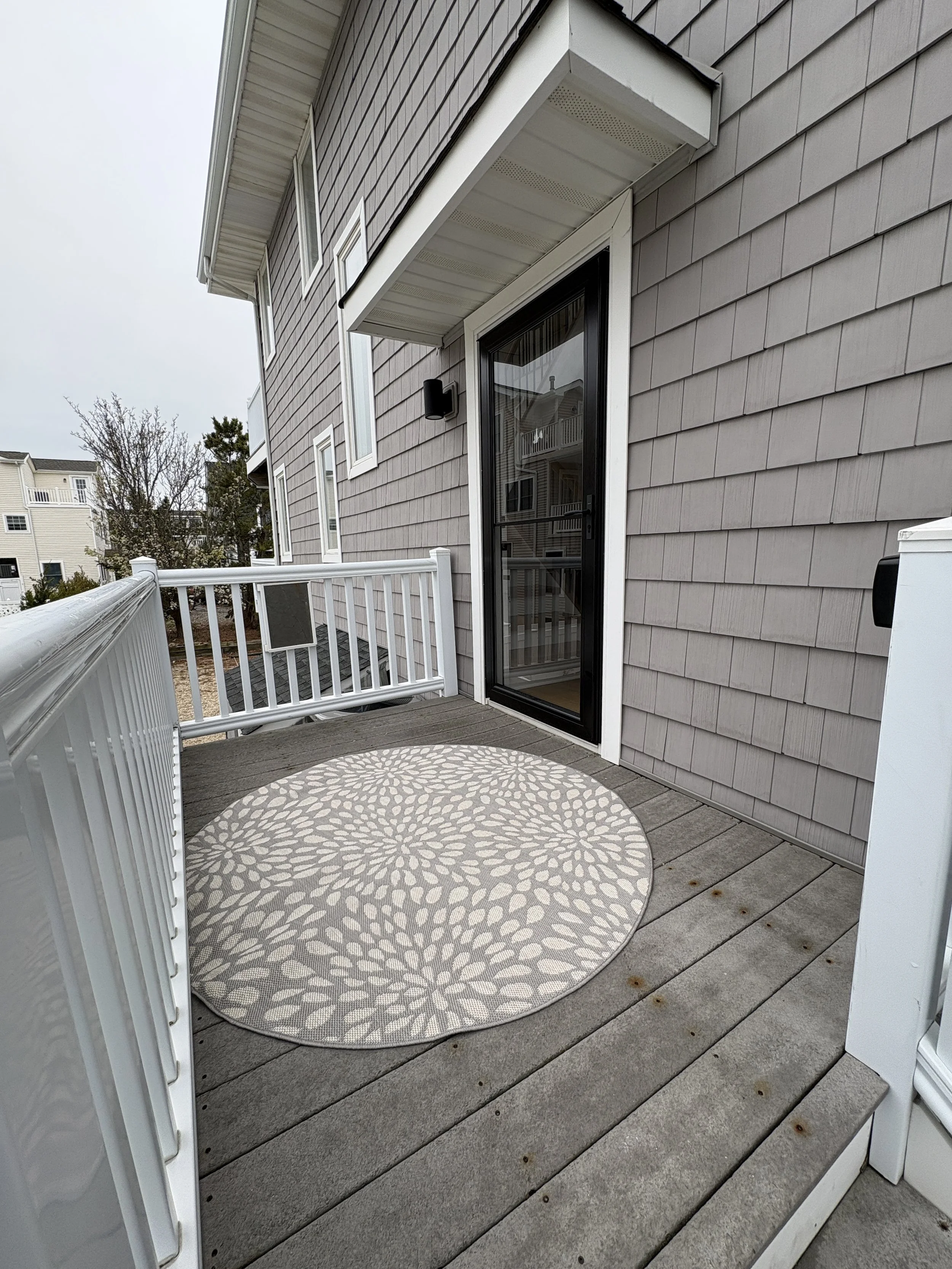 Entrance with new front door and storm door