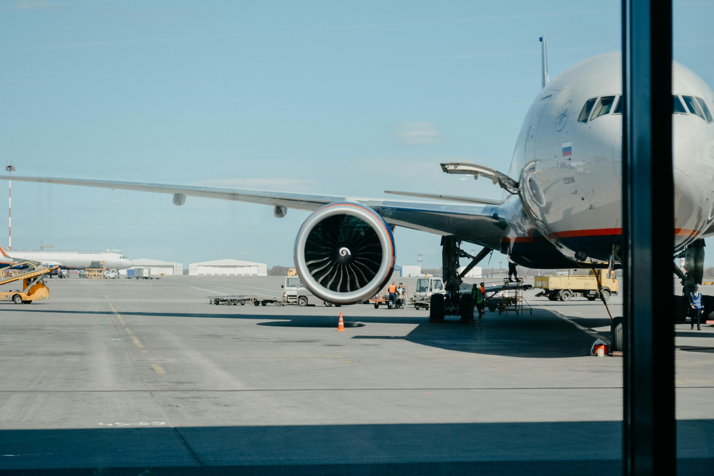 An airplane parked at the gate