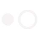Simple black square with two white circles, one small and one large, next to each other.