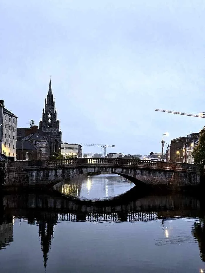Nano Nagle Bridge and Holy Trinity Church spire on the River Lee, Cork