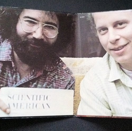 Open album cover featuring a photo of Jerry Garcia and Howard Wales holding up an issue of Scientific American