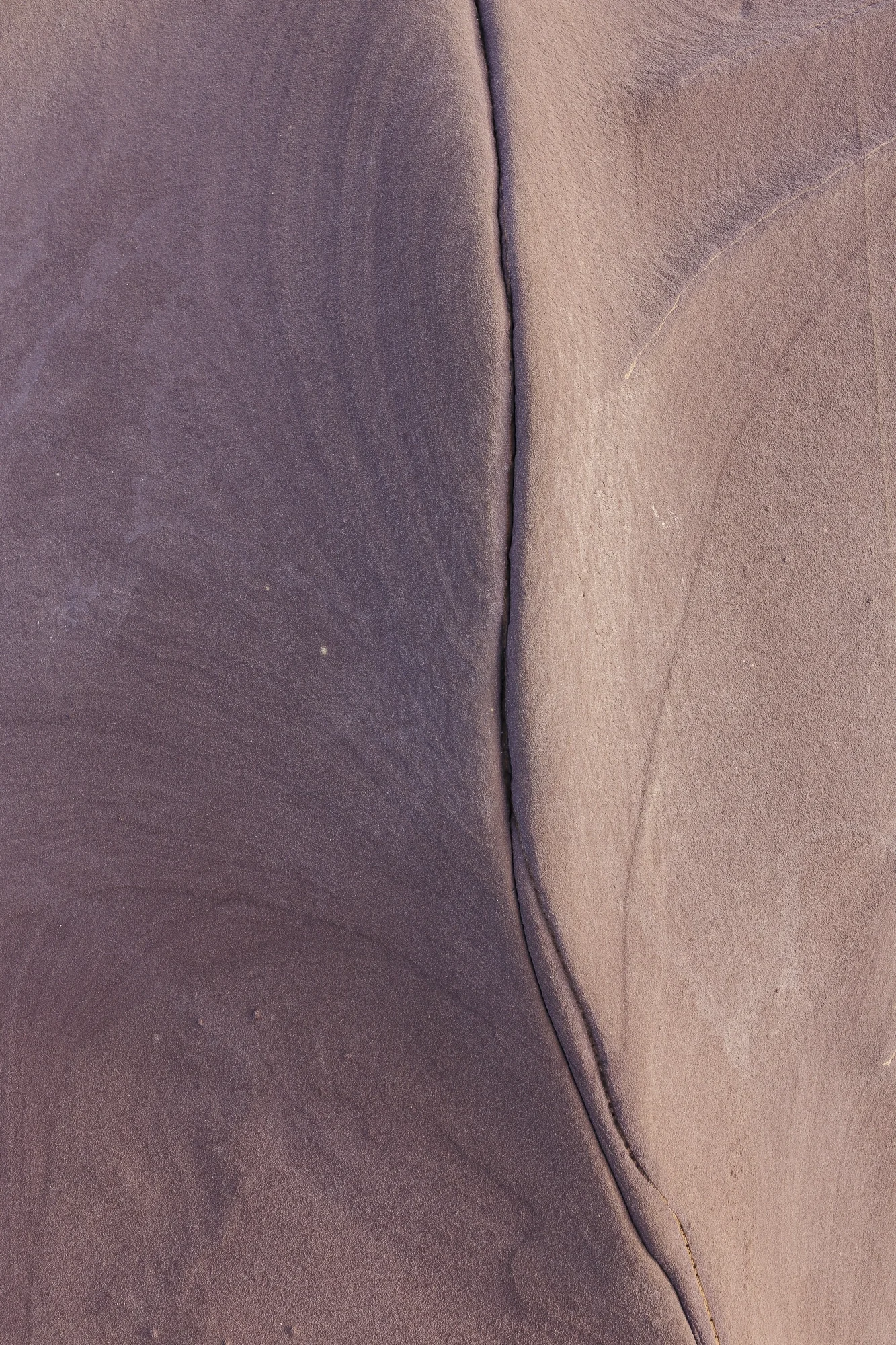 A quiet study in colour, texture, and time, this intimate sandstone abstract reveals the beauty hidden in Australia's ancient landscapes. 