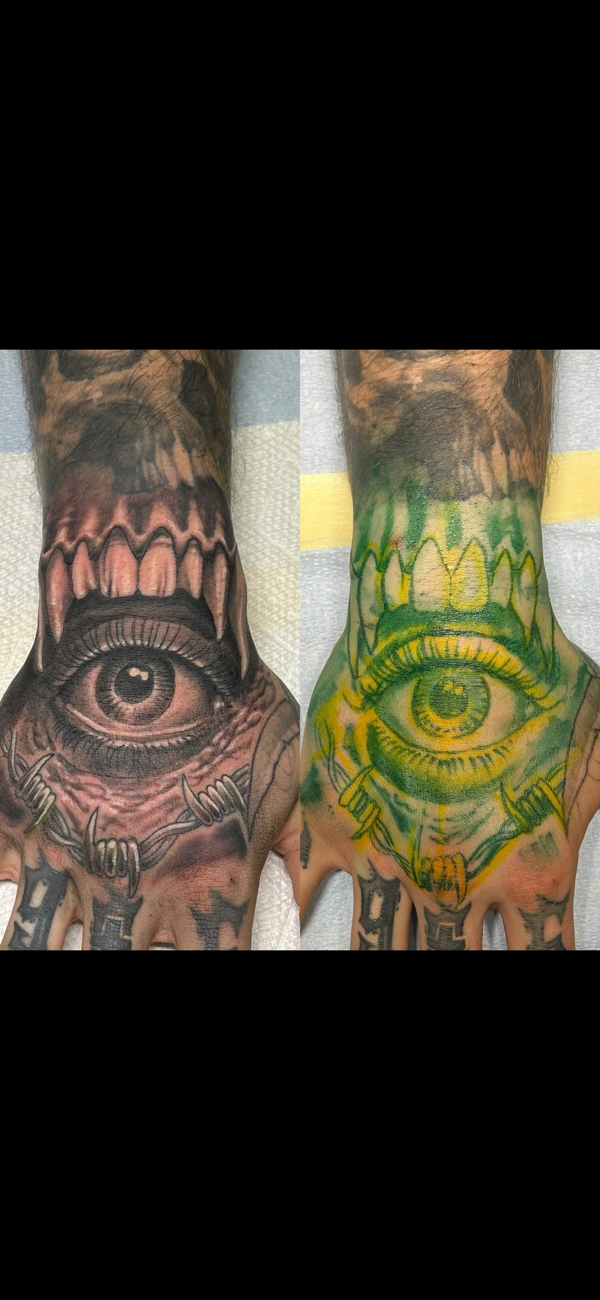 Tattoo of a large eye with a sinister outlined eyelid, surrounded by a skull with sharp teeth and long tongue, on the person's hand. 