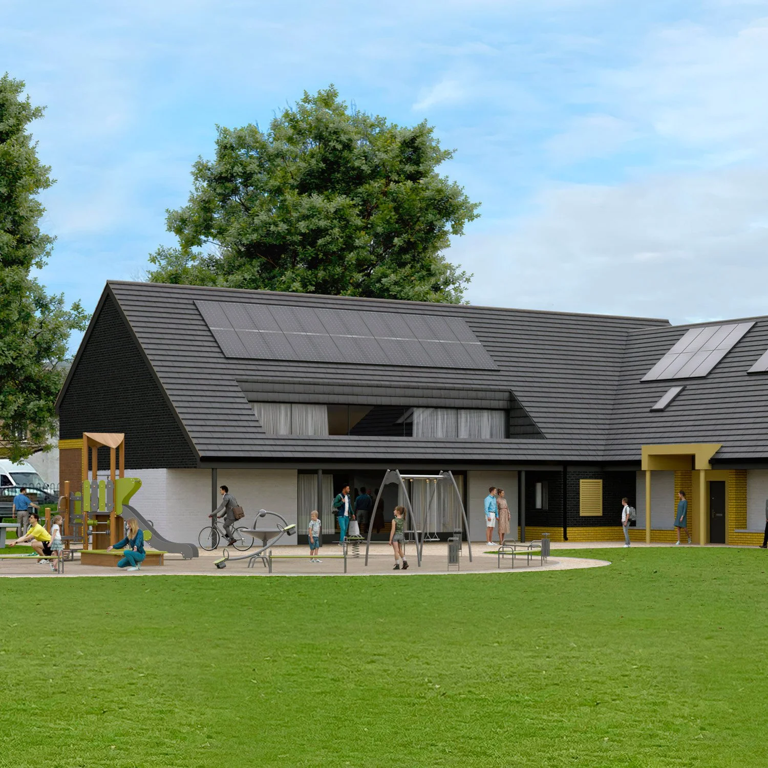 Children and adults playing on a playground in front of a modern building with solar panels on the roof and a grassy area in the foreground.