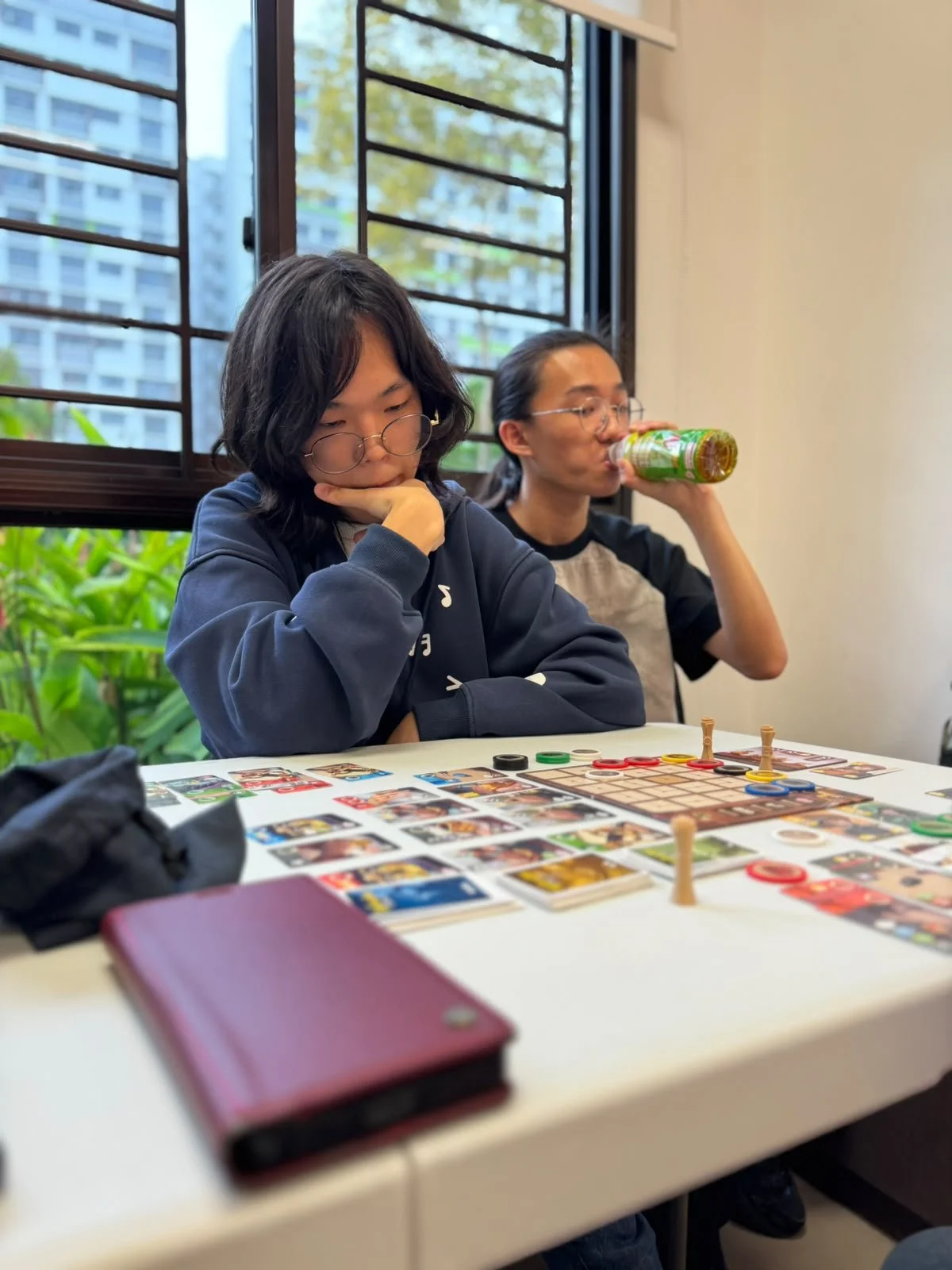 Gamemaster playing a board game.