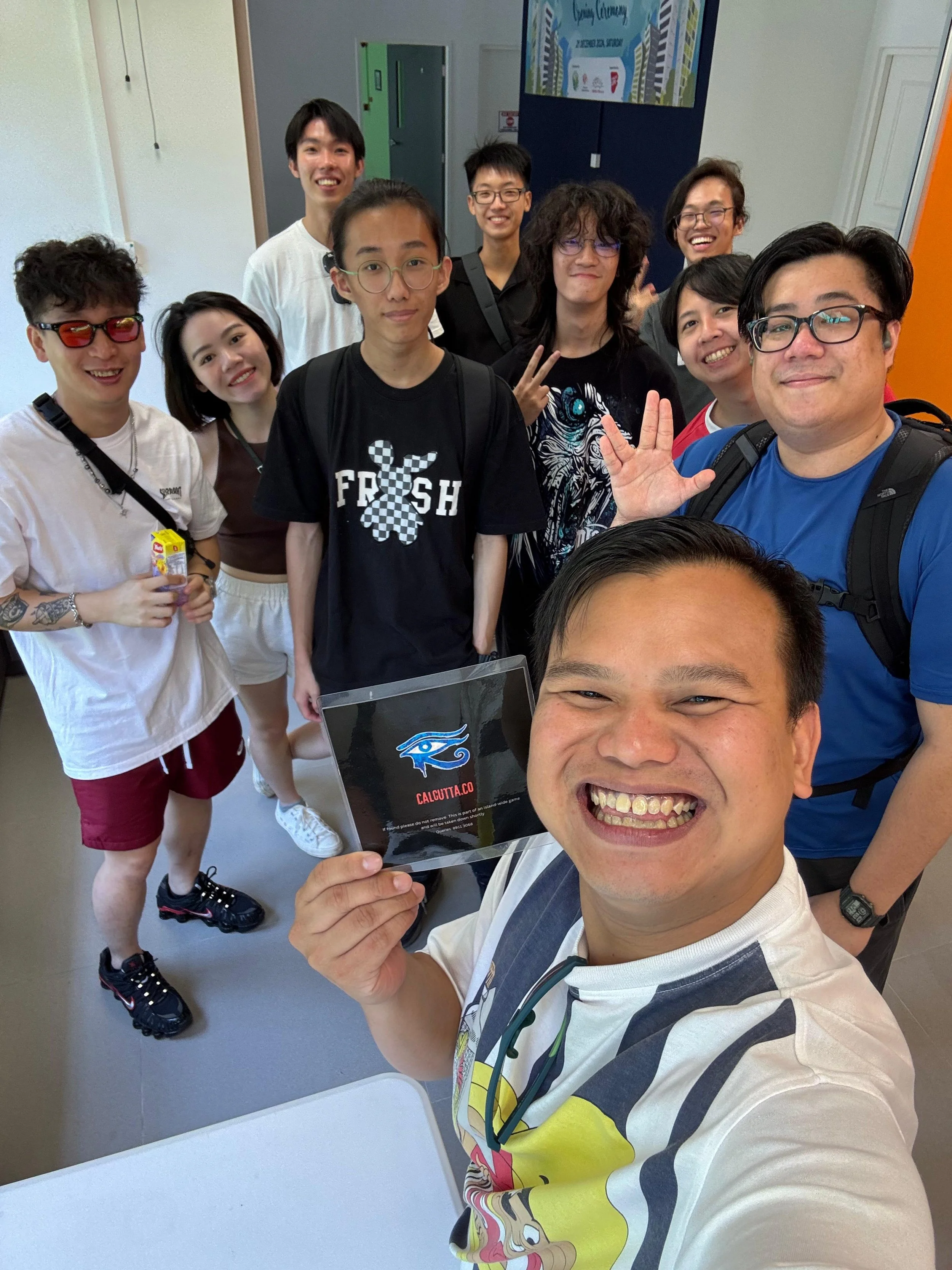 Selfie of the group amazing race players with the gamemasters.
