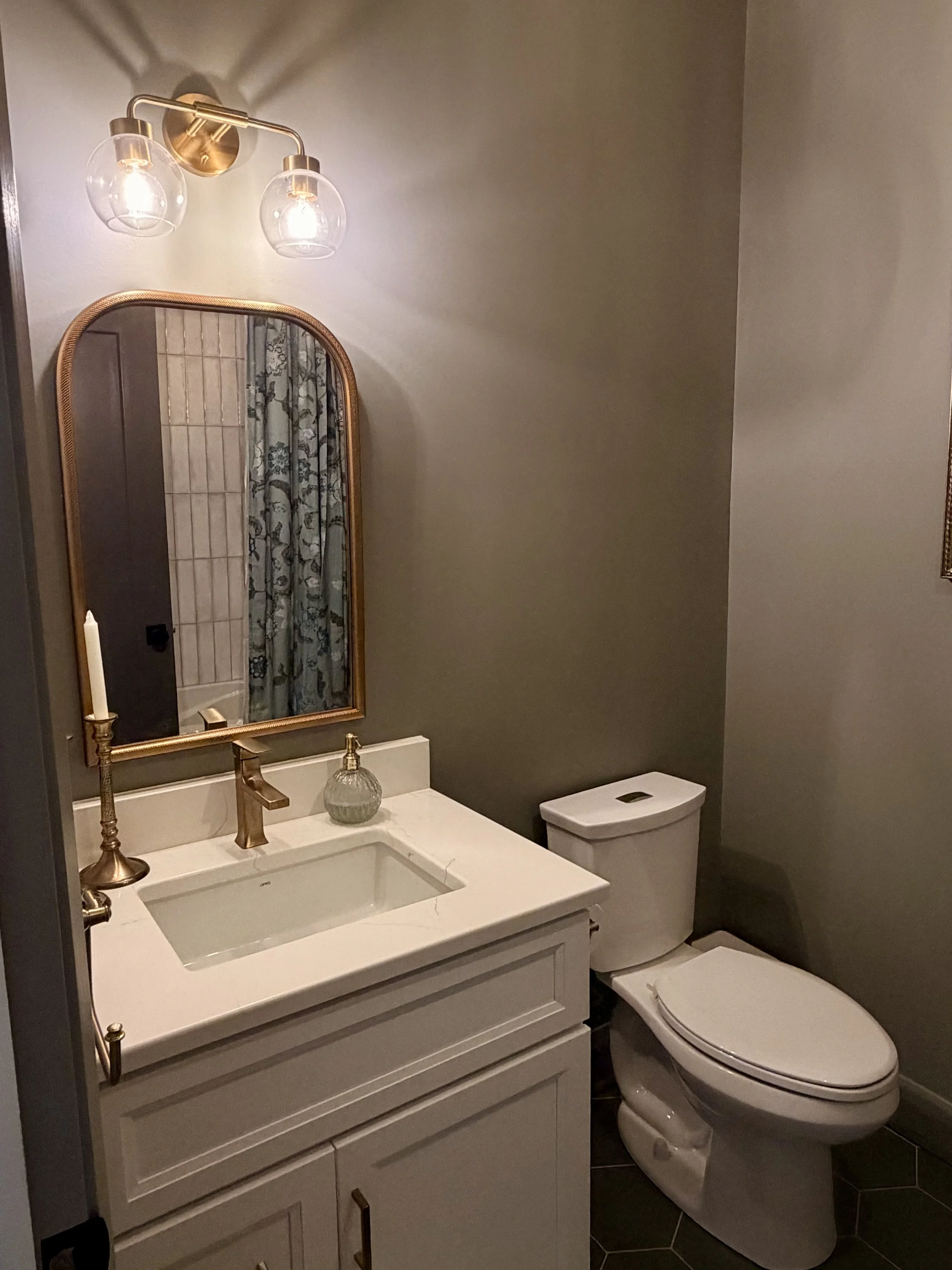 GUEST BATHROOM. SHOWER. VANITY. RIGHT-HEIGHT, ELONGATED TOILET. 