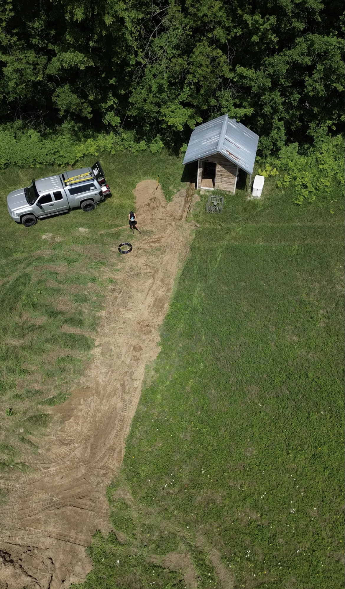 TRENCHED A WATERLINE IN FROM THE WELL PUMP HOUSE TO THE MODULAR UNIT. EXCAVATION AND BACKFILLED BY BACKCOUNTRY. 