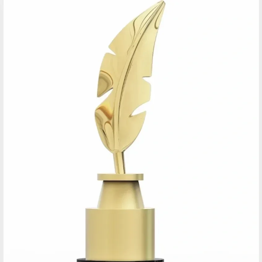 Gold trophy shaped like a feather on a cylindrical base.
