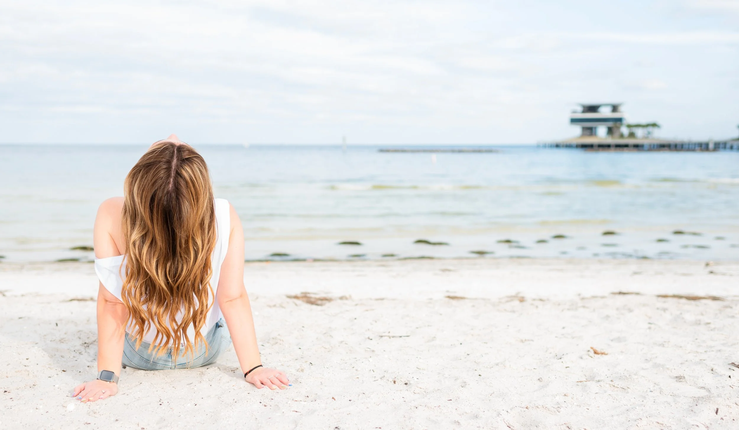 Woman sitting on a beach