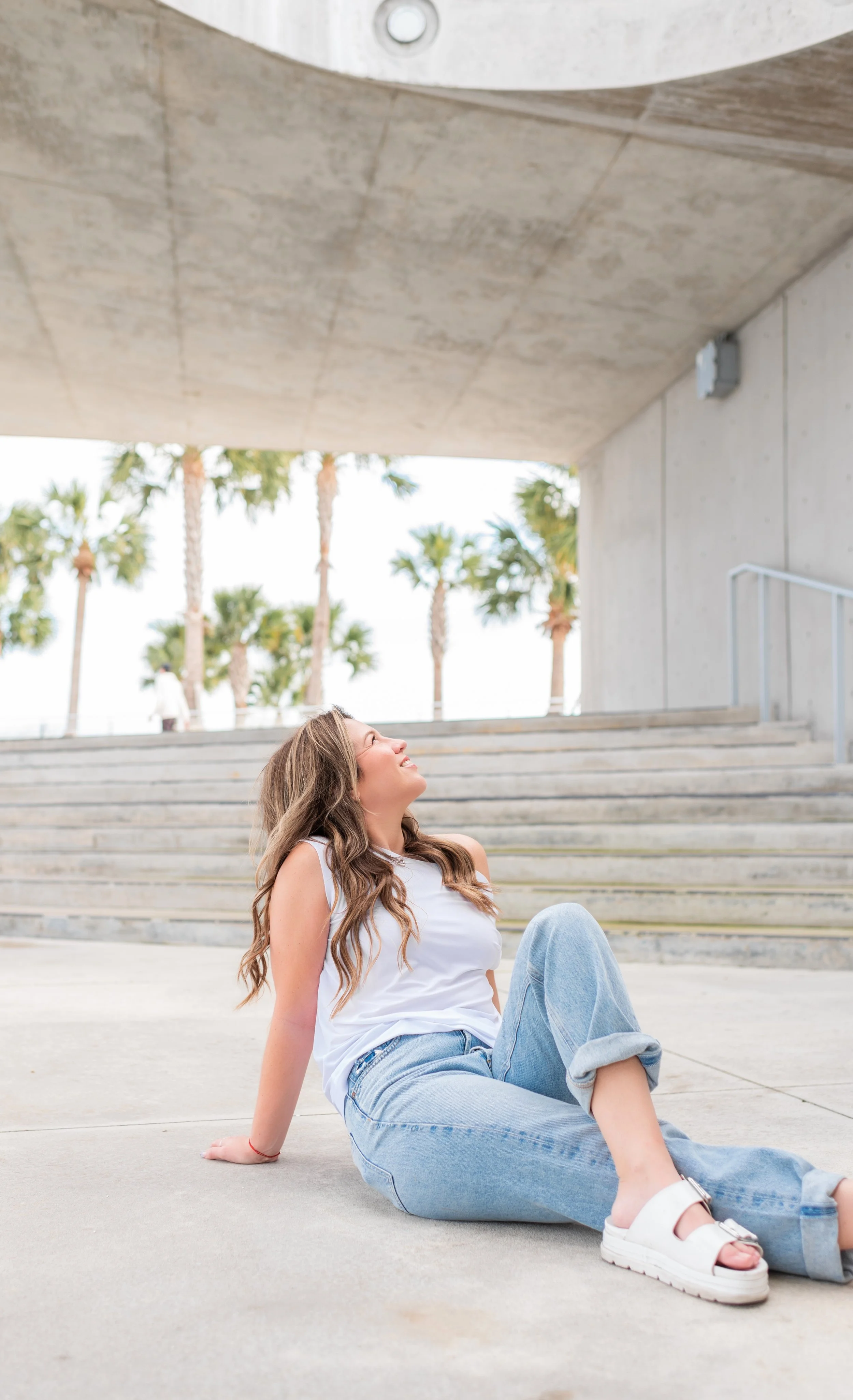 Erin Mort sitting in an open outdoor pavilion
