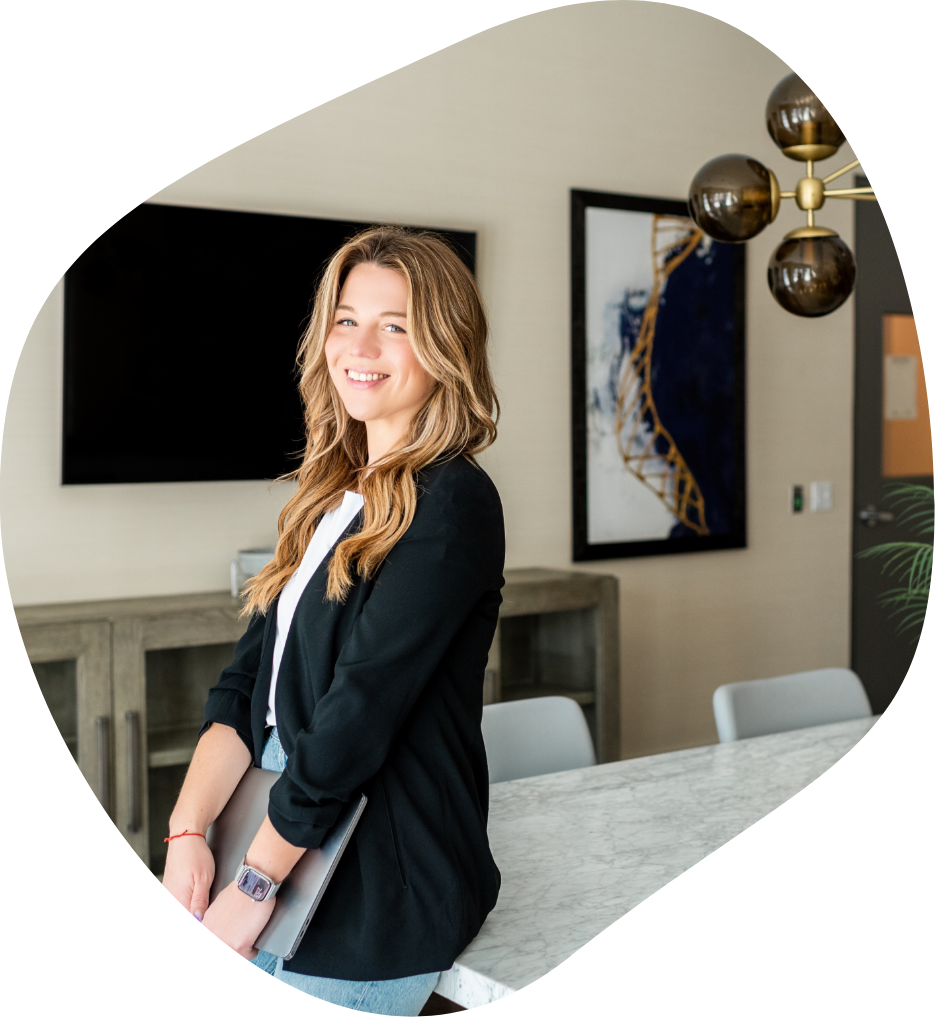 Woman wearing a black blazer in an office