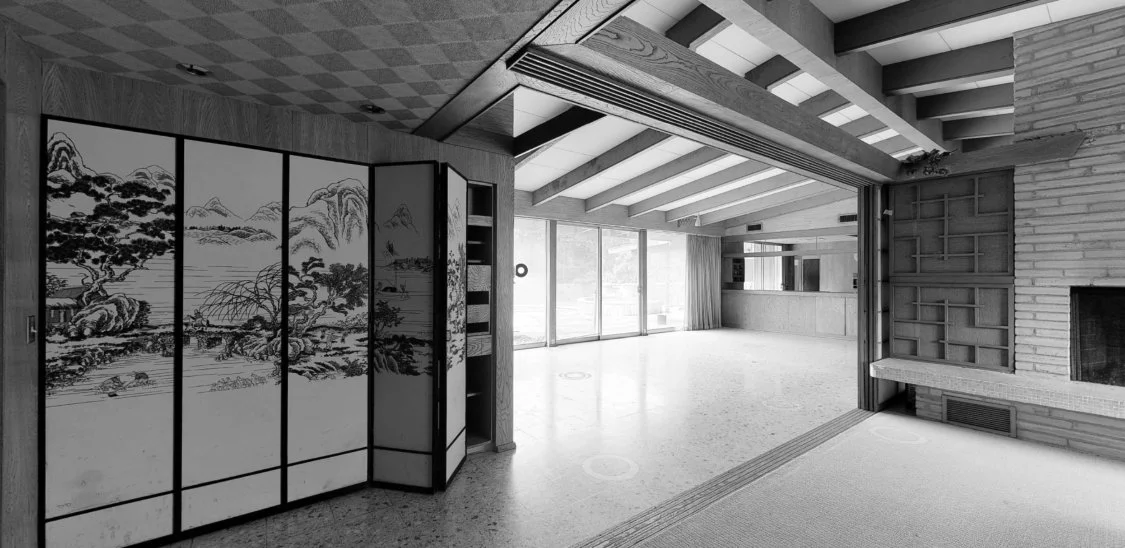 Interior view of Castle Hills Residence showing midcentury home renovation with updated living spaces, preserved architectural character, and contemporary design interventions.