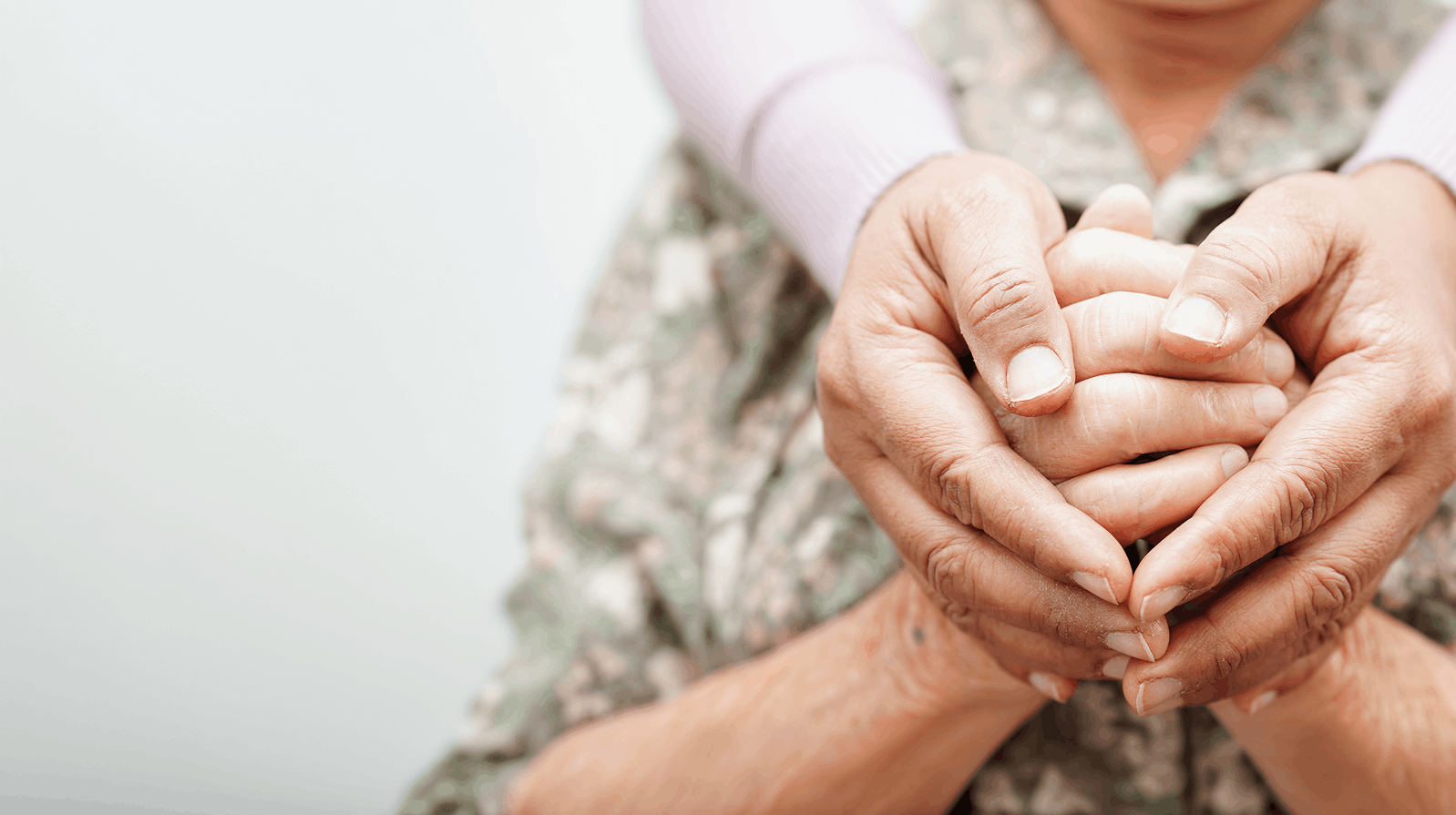 Photo of people holding hands
