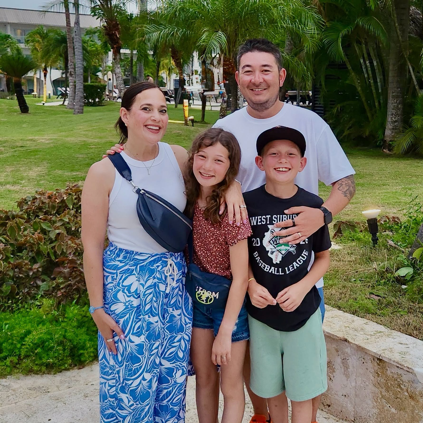 Tyler Dameron's family posing outside for a photo