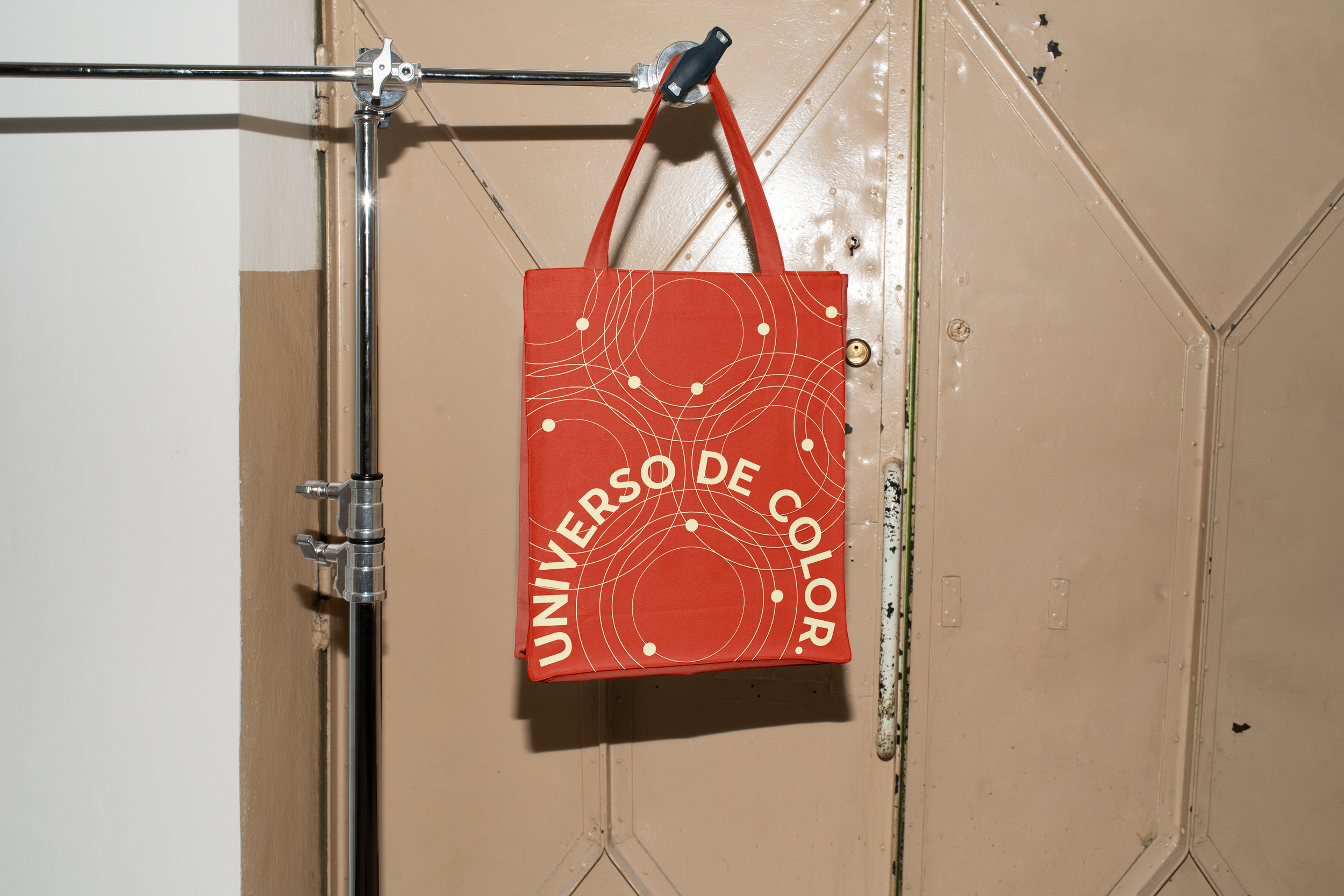 Free Canvas Bag Hanging on Tripod Mockup.png