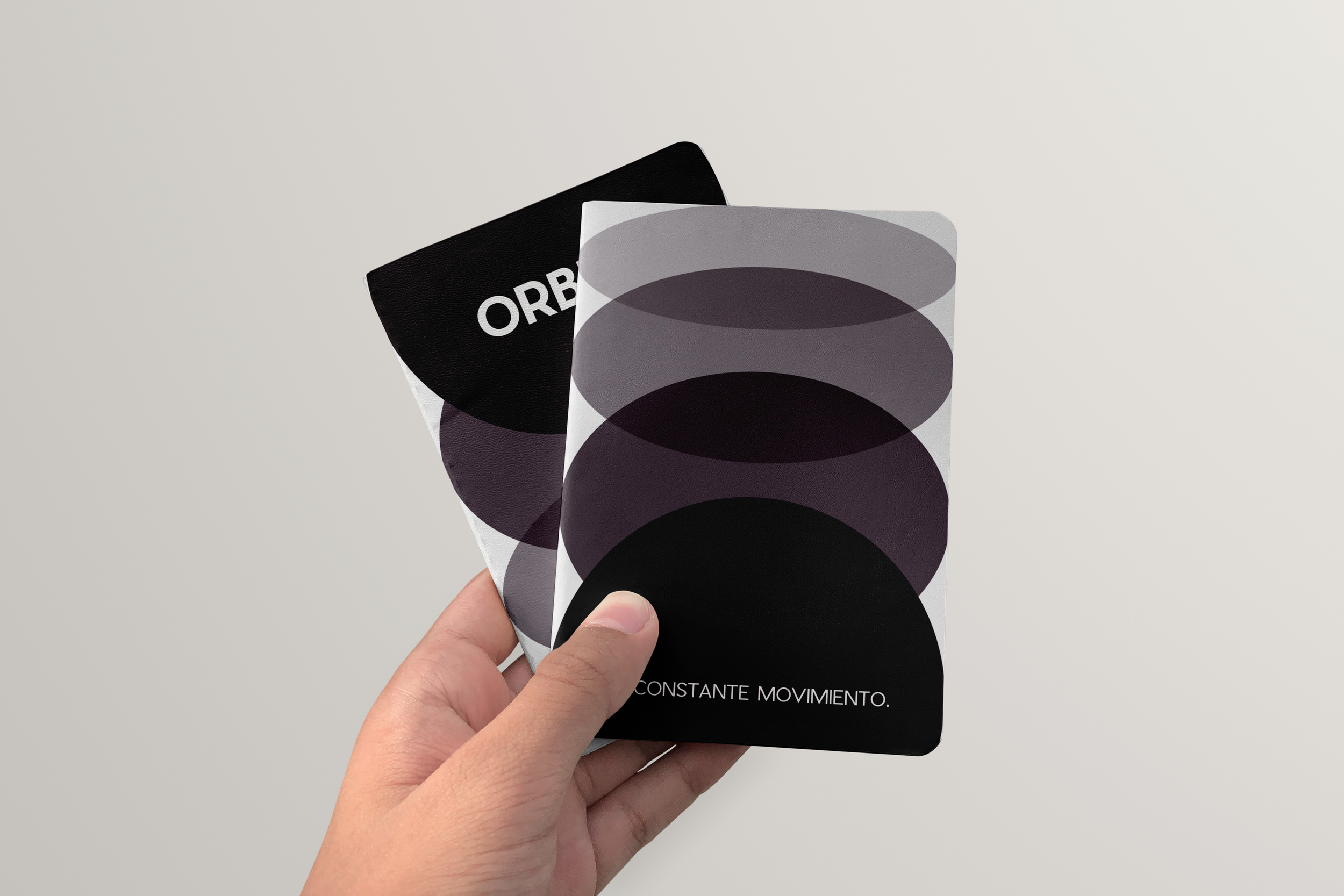Free Two Notebook in Hand Mockups.png