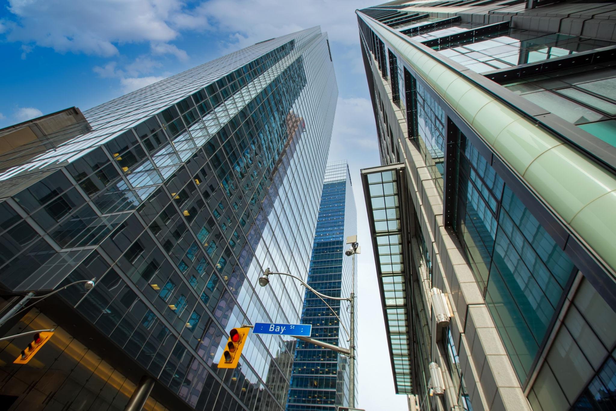 Glass office skyscrapers along Bay Street in Toronto's financial district
