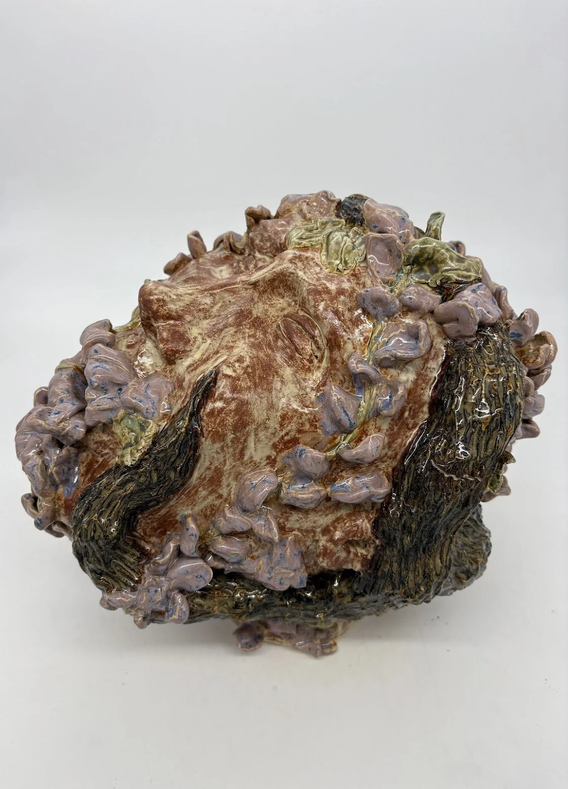 Exchange Participant 1 [side view]. B clay and Overglaze. 11.75” x 15” x 11.5”.