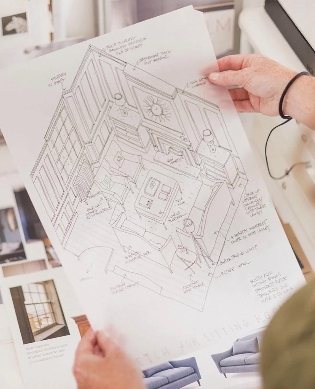 Drawing of a living room floor plan with detailed notes and furniture layout