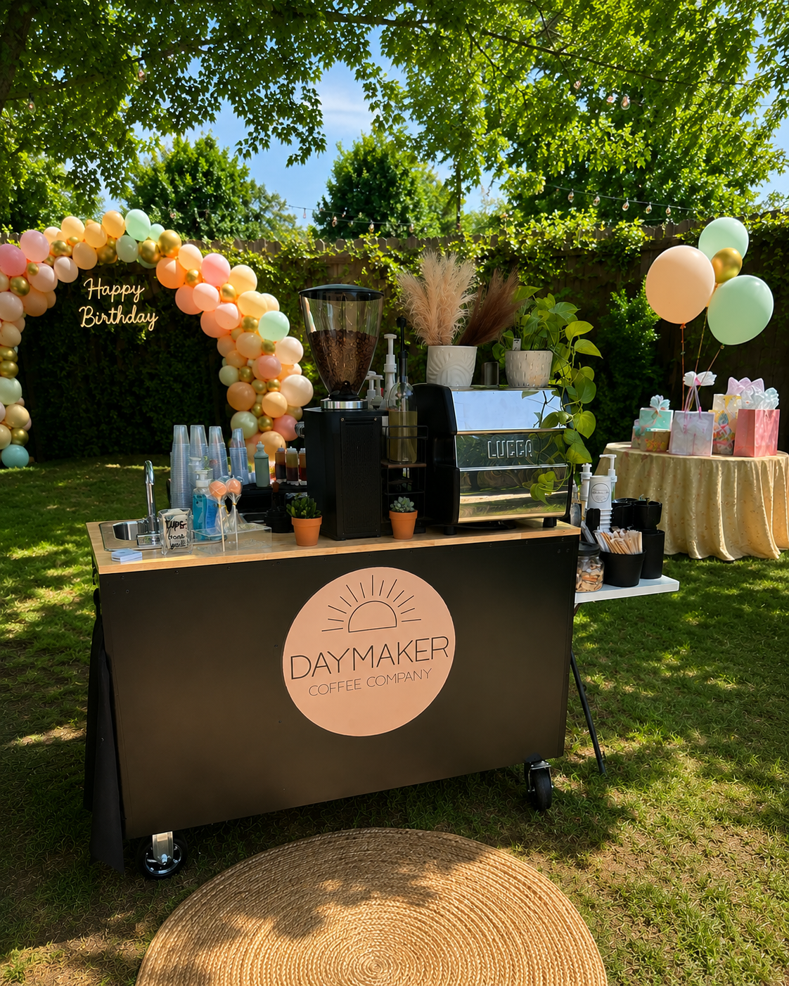 Daymaker Coffee Company mobile coffee cart and espresso bar catering an outdoor birthday party with custom event decor and specialty coffee drinks in Raleigh, North Carolina.