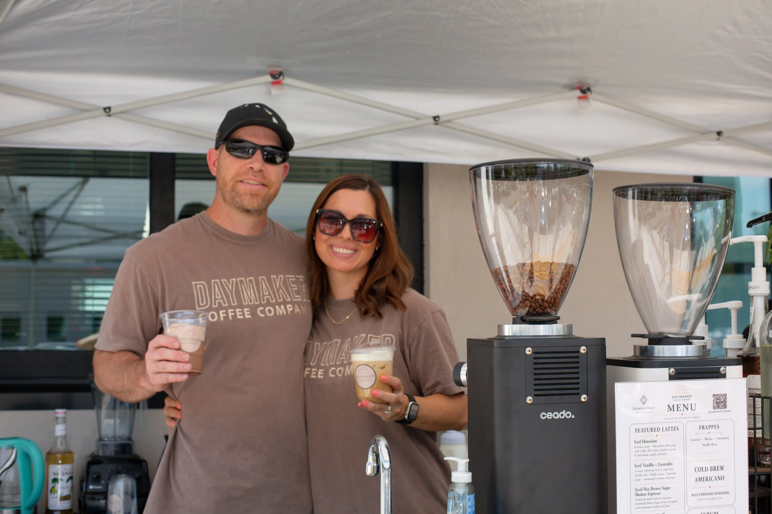 Owners of Daymaker Coffee Company with their mobile espresso bar serving handcrafted coffee at corporate events throughout Raleigh, Durham, Chapel Hill, Cary, Wake Forest, and Apex
