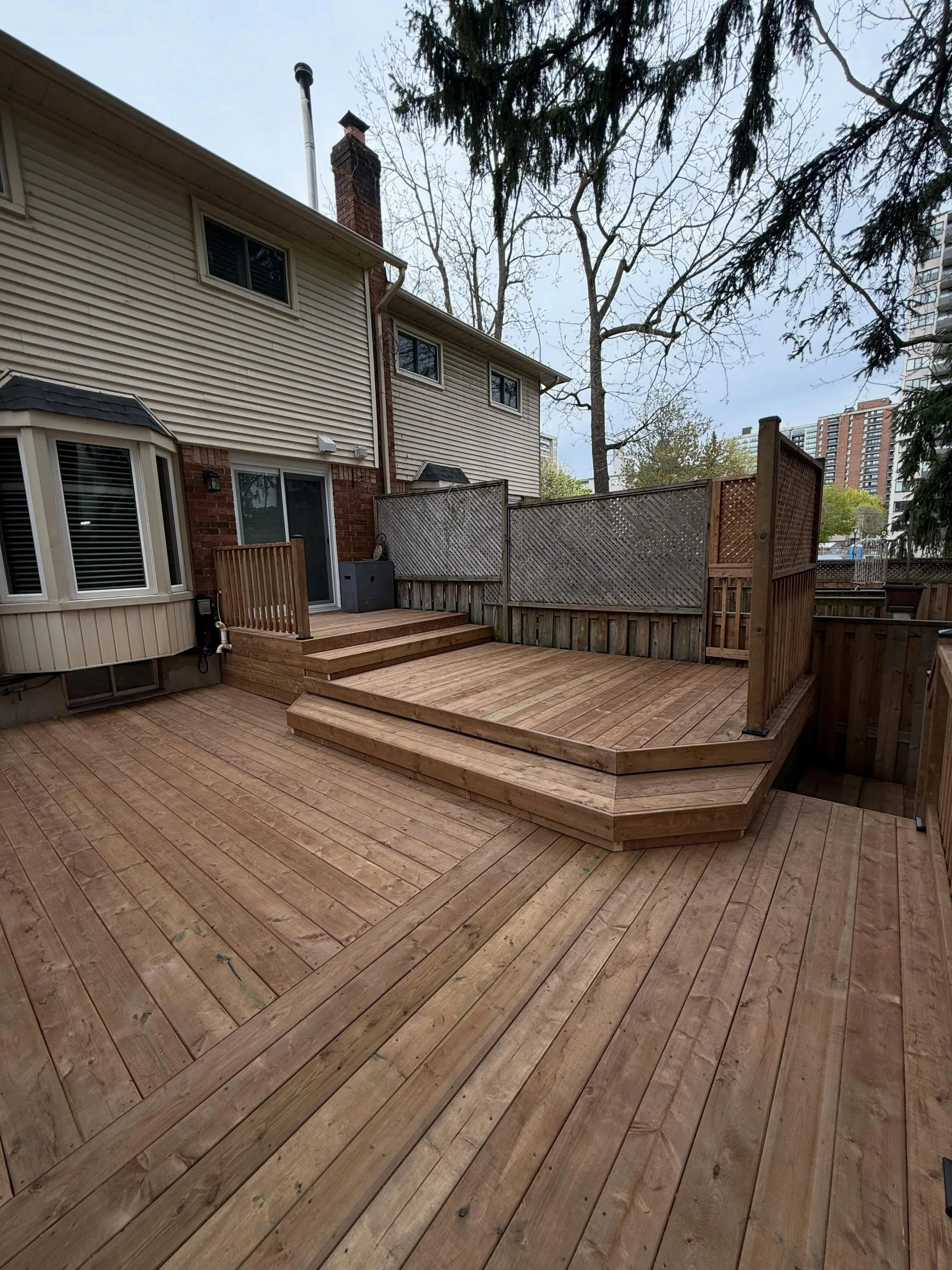 Complete deck reface for this backyard transformation 🔨

We kept the existing structure in place, made the necessary structural repairs, and gave the entire space a fresh new look with:
&bull; New deck boards
&bull; New railings
&bull; New lattice
&