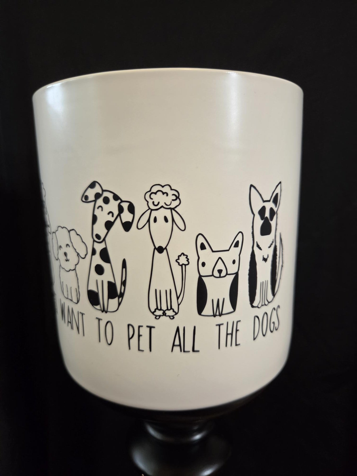 White ceramic planter featuring adorable illustrated dogs wrapped around the planter with the phrase "I Just Want to Pet All the Dogs," complete with a matching ceramic tray.