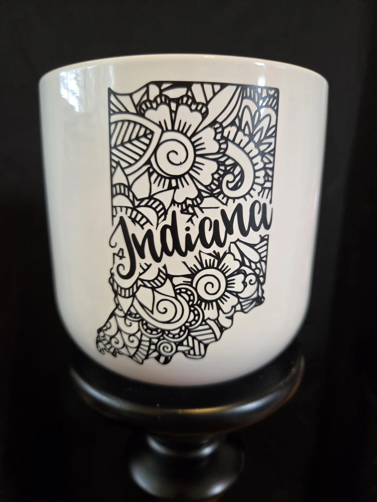 White ceramic planter featuring a detailed floral Indiana state outline with matching ceramic tray.