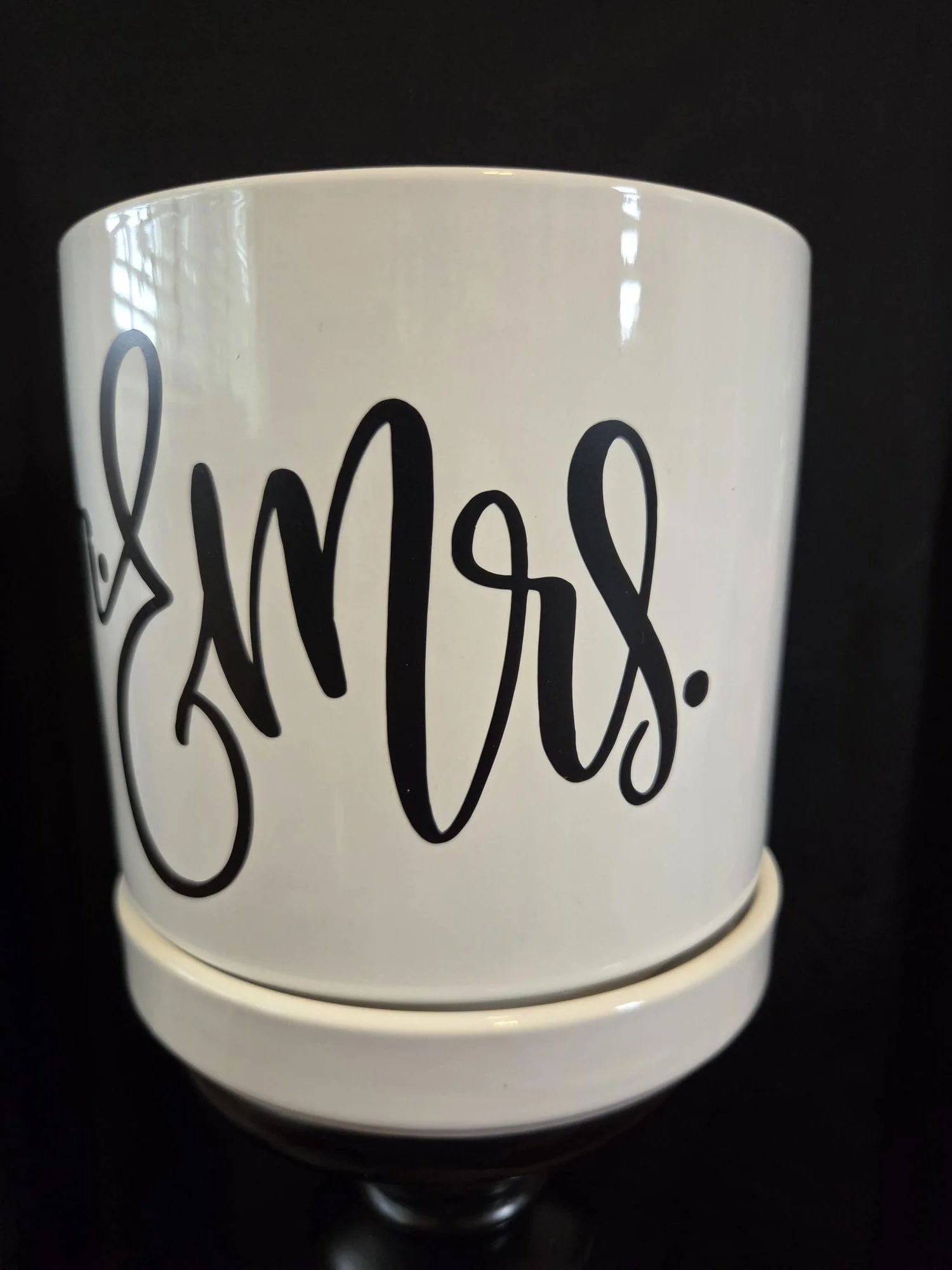 White ceramic planter personalized with a custom name in elegant black script, complete with a matching ceramic tray.