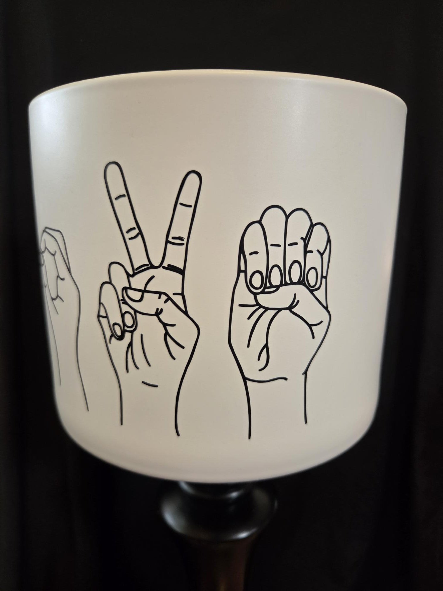 White ceramic 7-inch planter featuring the American Sign Language alphabet illustrated around the entire planter with detailed hand signs.