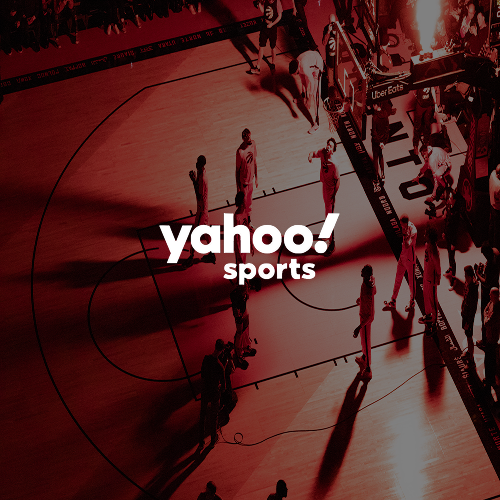 Yahoo Sports logo displayed over a basketball game in progress