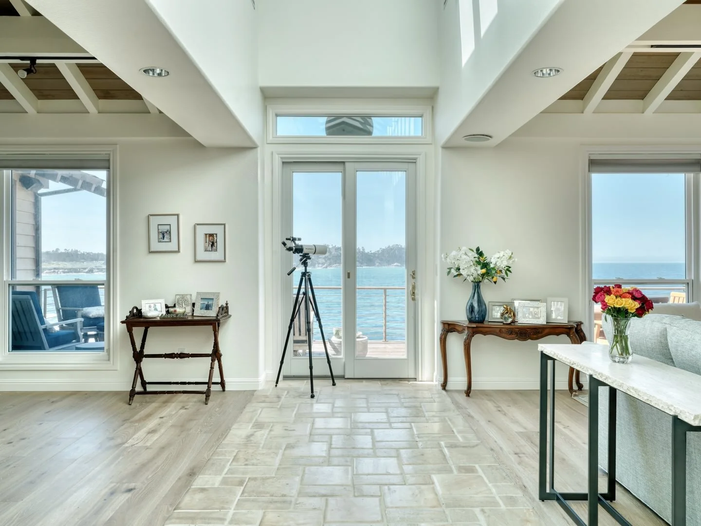 living space with an open and bright feeling, showcasing the stunning view of the ocean